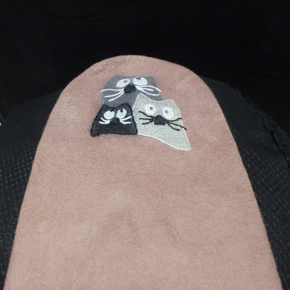 Hand-felted woolen hat with  decoration